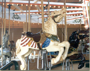 Image: One of two flag horses on Shelby's carrousel.